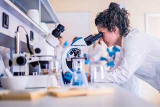 Scientists In Laboratory Working On Research Stock Photo 1012405368 Blue Filter